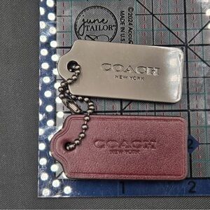 Coach Silver and Burgundy Hangtag Set
